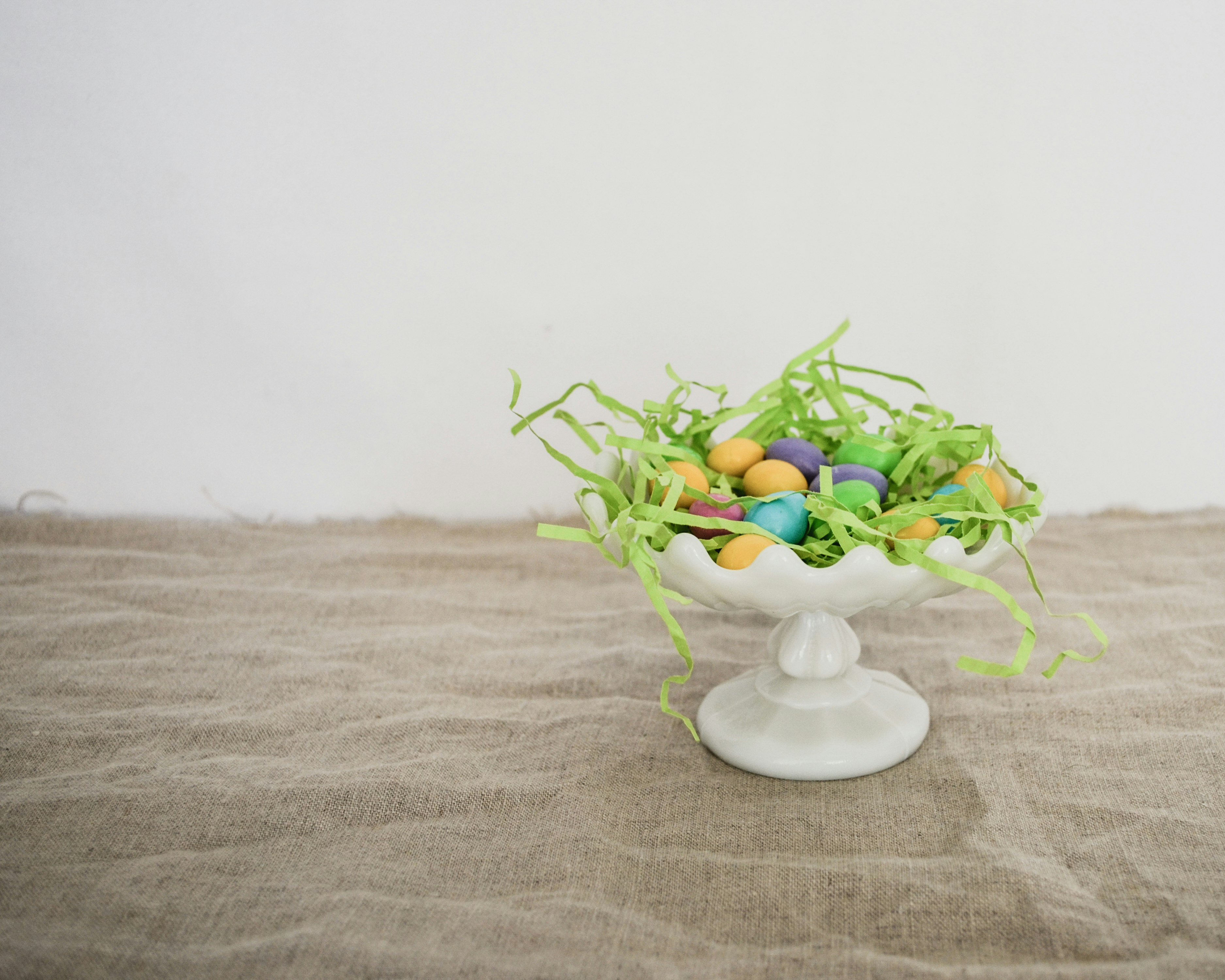 white ceramic footed bowl